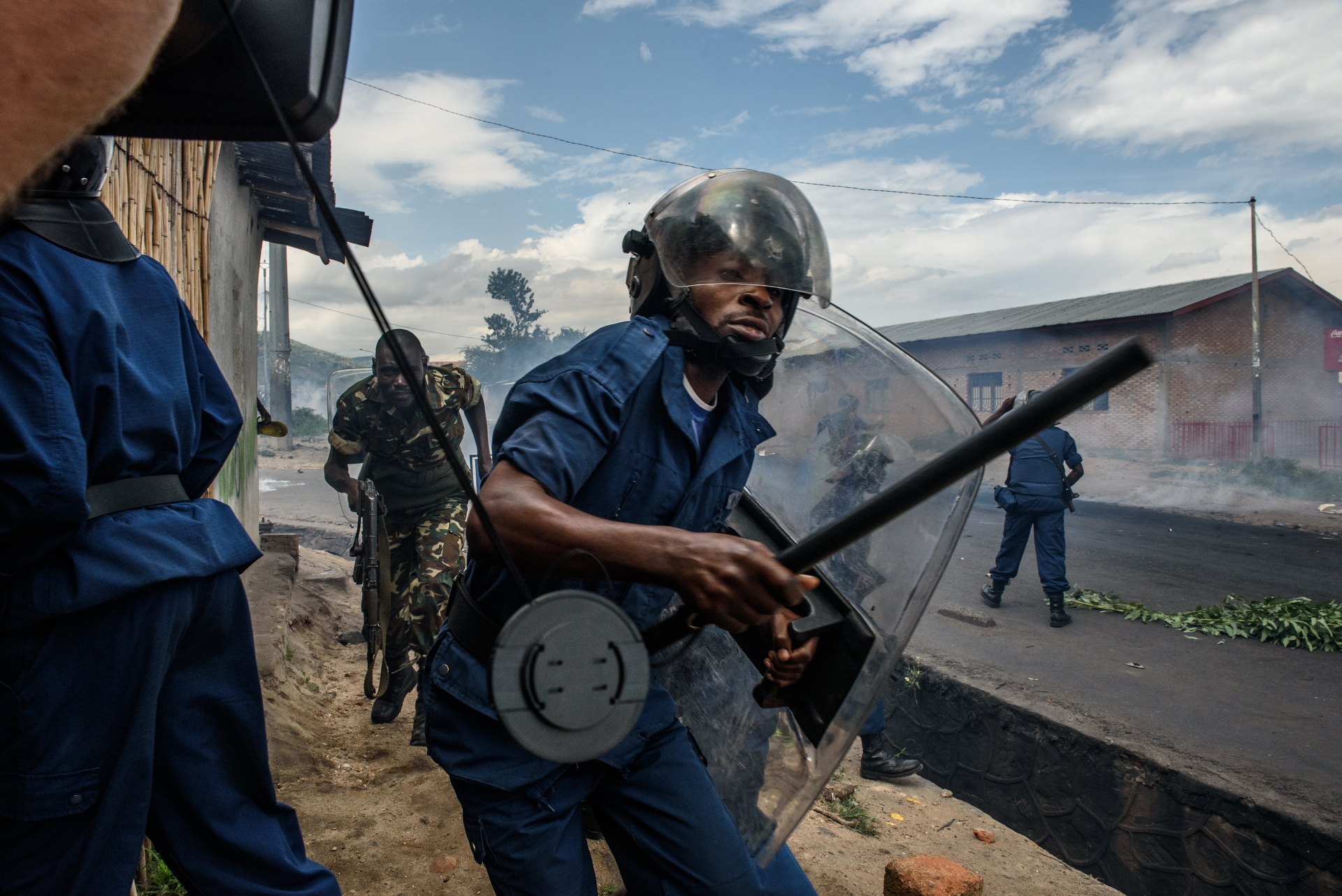  Bujumbura police chase protesters in Musaga on 13 May 2015. Demonstrations protesting incumbent president Pierre Nkurunziza's bid for a 3rd term continued in Bujumbura, Burundi on 13 May 2015. 