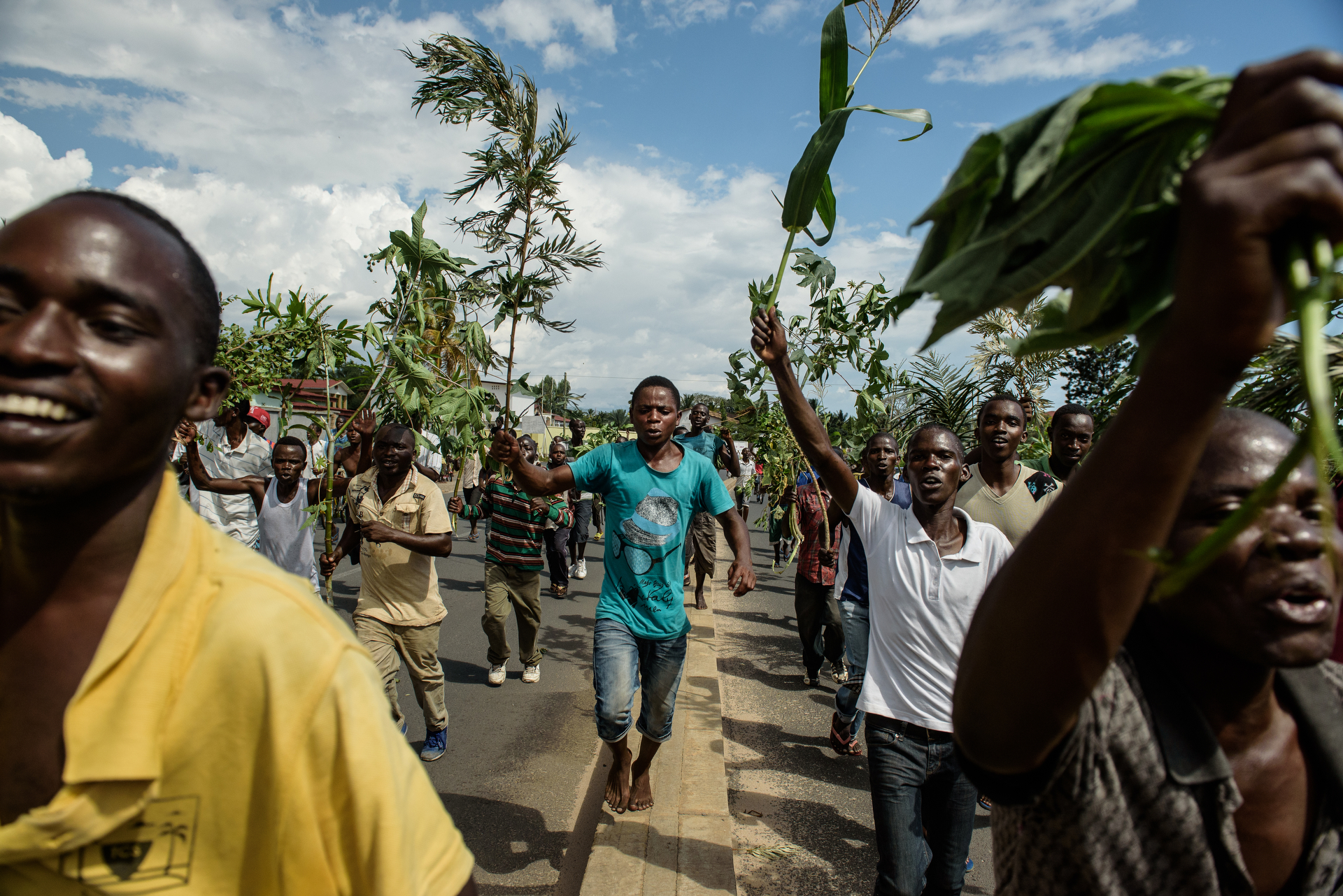  Following the radio announcement by Major General Godefroid Niyombare that President Nkurunziza was overthrown, people took to the streets to celebrate, waving branches, and parading through Bujumbura on 13 May. 