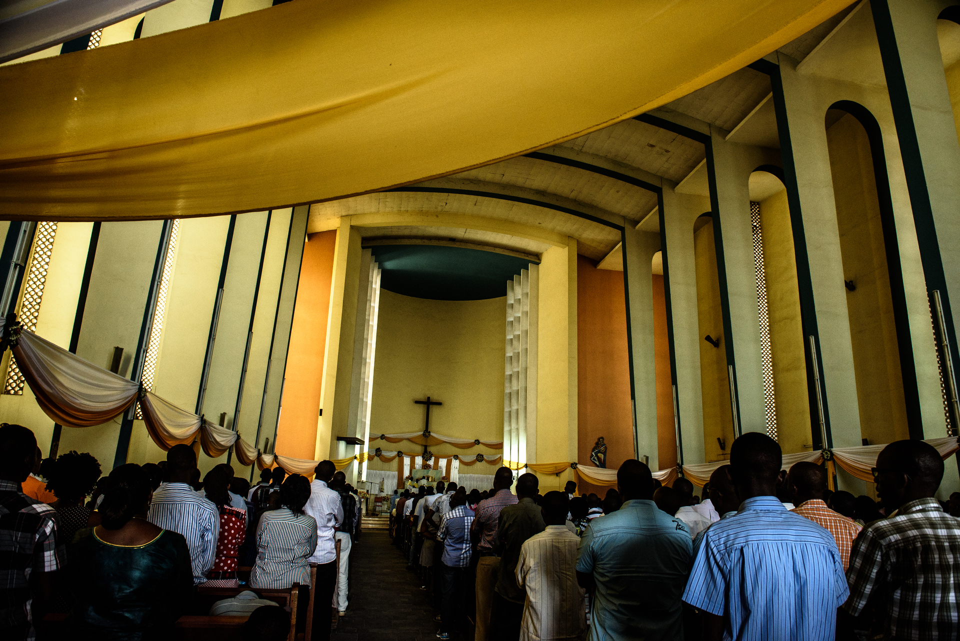  People pray inside Queen of the World Cathedral in downtown Bujumbura on Sunday 17 May following a coup attempt by General Niyombare. 