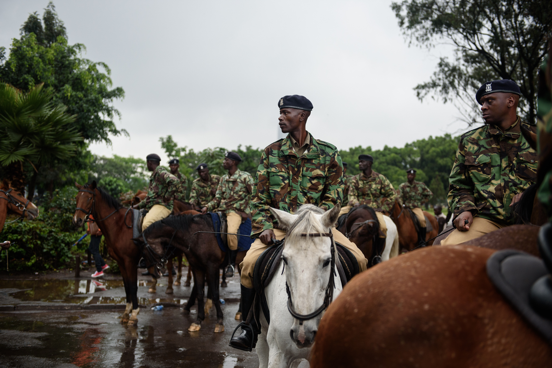  Kenyan mounted security patrol Uhuru Park and central Nairobi ahead of the Pope's speech at University of Nairobi on 26 November 2015. Pope Francis is on a five-day visit to Kenya, Uganda and Central African Republic (CAR). AFP PHOTO/Jennifer HUXTA
