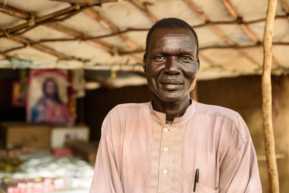  Gabriel Mujak Joak, a trader in Nyal market, offers food and other necessities on credit to trusted community members because he realizes it's essential to support them. 