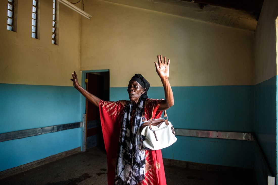  A woman mourns the death of her relatives at the morgue in Kisumu, Kenya, where the bodies of men killed in the protests were kept.  27 October 2017.  