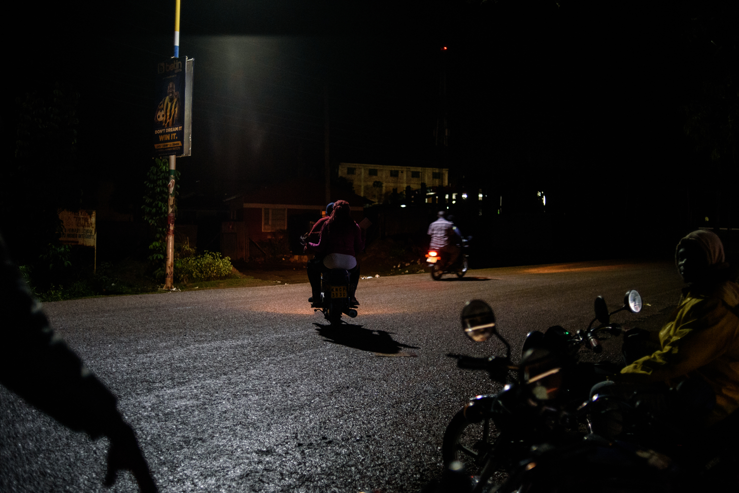  Shantel takes a motorbike taxi to pick up condoms and hand them out to young sex workers in Homa Bay. 