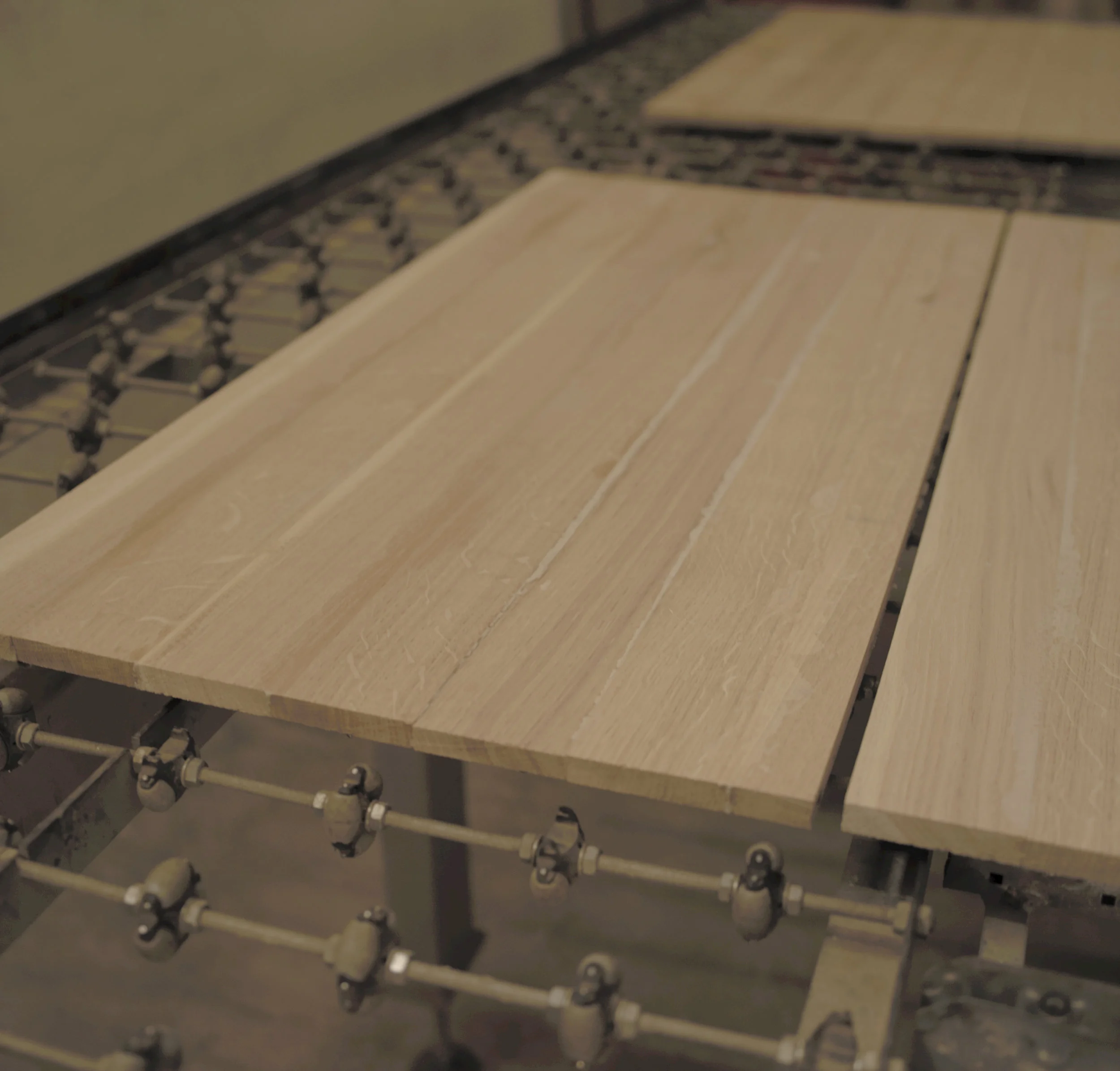 After cutting and gluing process, the wood pannel is converted into specific parts for the piece of furniture, using our CNC machines.