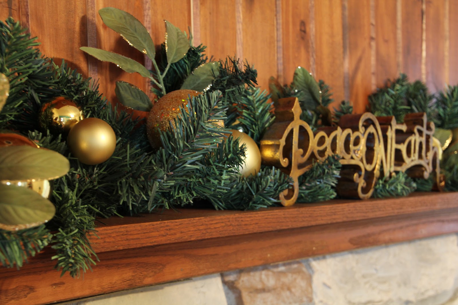 ideas-living-room-delightful-living-room-mantel-with-green-garland-along-with-golden-christmas-balls-and-wooden-mantel-shelf-christmas-themed-mantel-decorating-ideas-christmas-fireplace-decorations-a.JPG