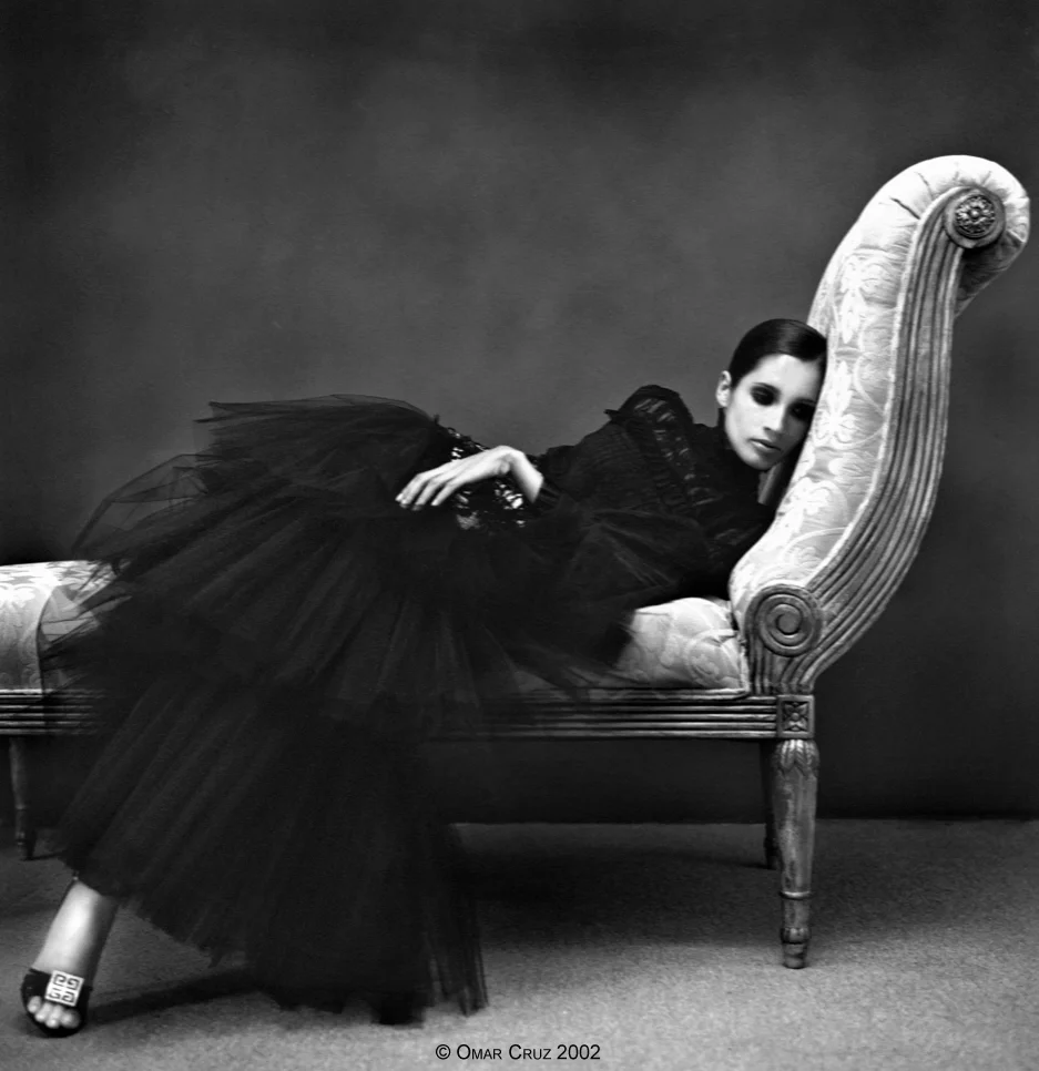 Astrid Muñoz 
San Juan 2002

One hand, one foot, one beautiful face&hellip;