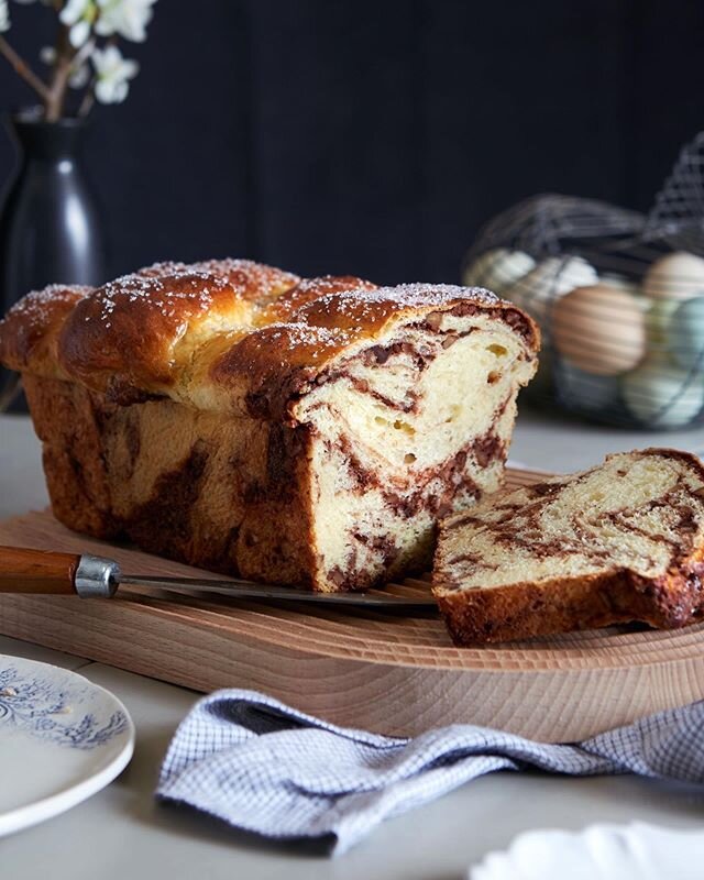 Sharing more images from a recent story I styled on Easter breads from around the globe! This one is a Cozonac de Nuca from Romania, a sweet bread with a meringue like chocolate and nut fulling that gets twisted and braided together into a beautifull