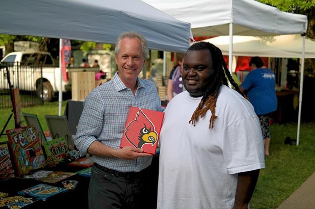 You never know who will show up at Springfest. Chimel Ford who did the Derby poster this year and Mayor Fischer talking Cardinals.