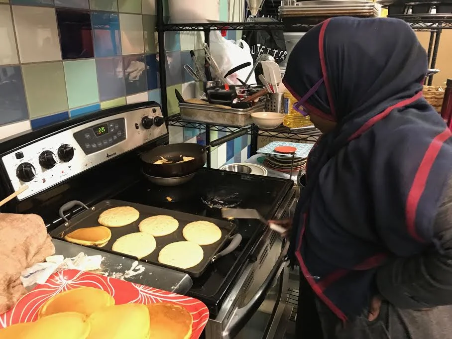 Hawa Jama making her very popular pumpkin spice pancakes