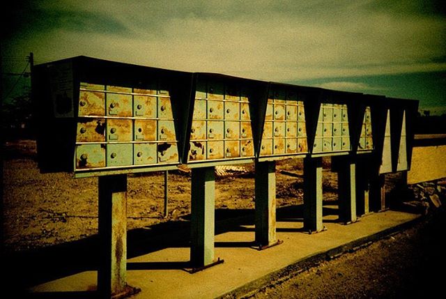 mail boxes, Salton Sea. Lomo LCA+, cross-processed slide film. #analogphotography #analoguephotography #analog #analogue #filmphotography #film #filmisnotdead #ishootfilm #filmcamera #lomo #lomography #lomographyfilm #lomolca #california #exploremore