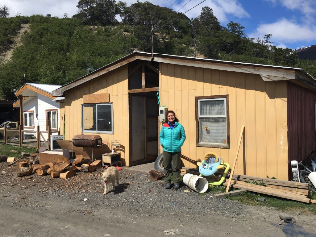 Alexandria Hawley, a research assistant on this project, standing in the village of Ukika.