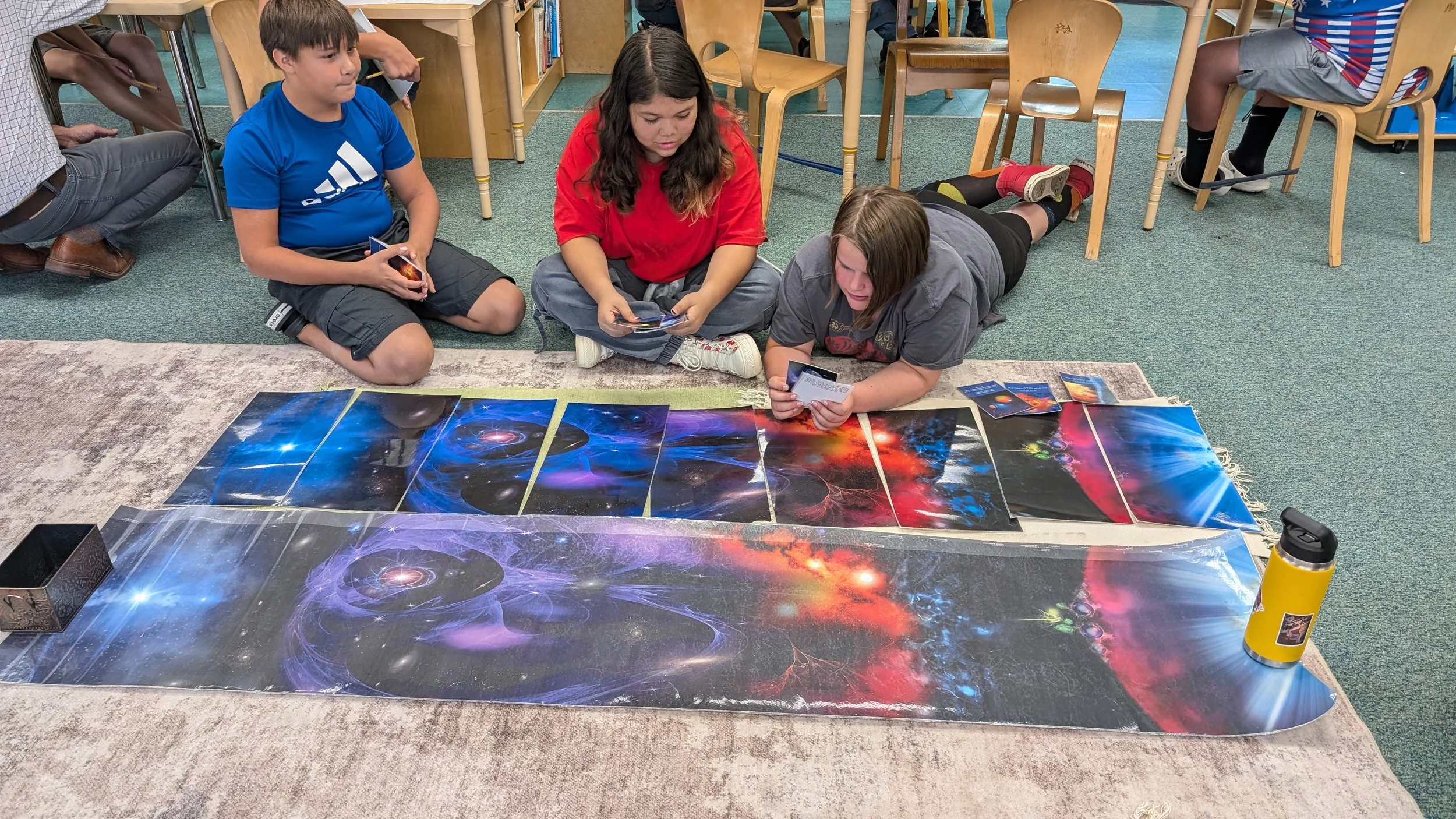 students working on the Timeline of the Universe