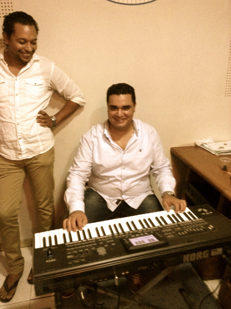 Mounir (tambourine player) messing around at the keyboard while actual keyboard player Amir laughs :) 