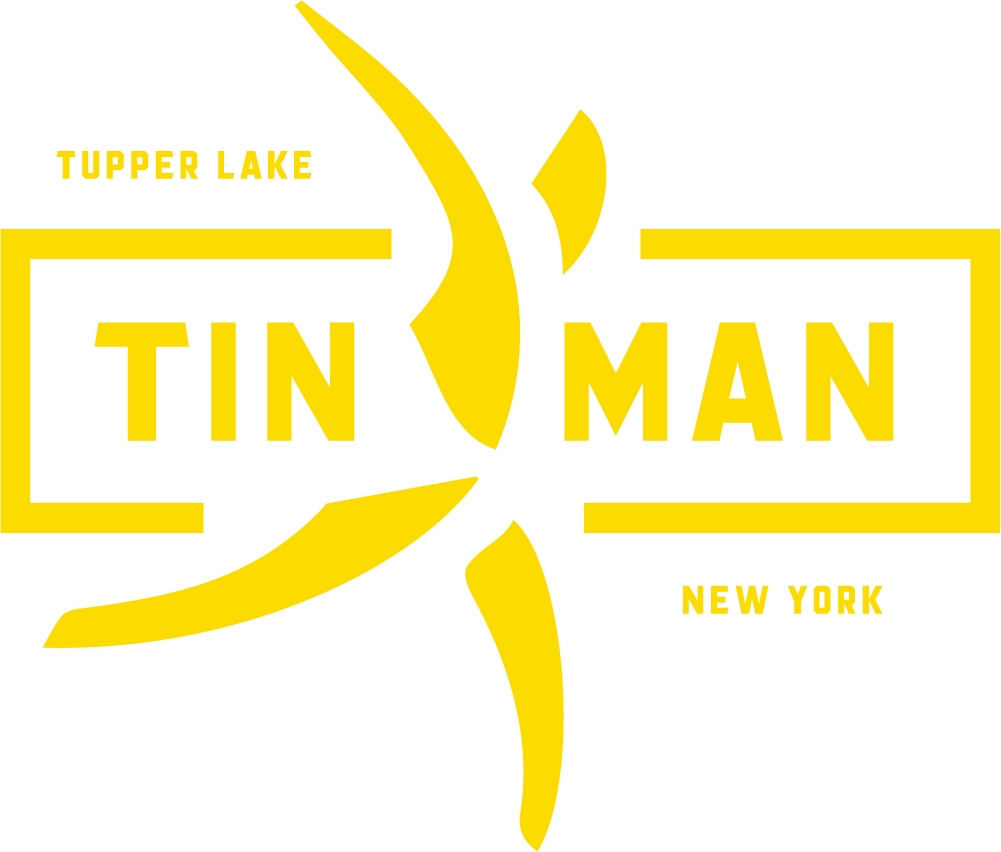 Tinman Logo Yellow.png