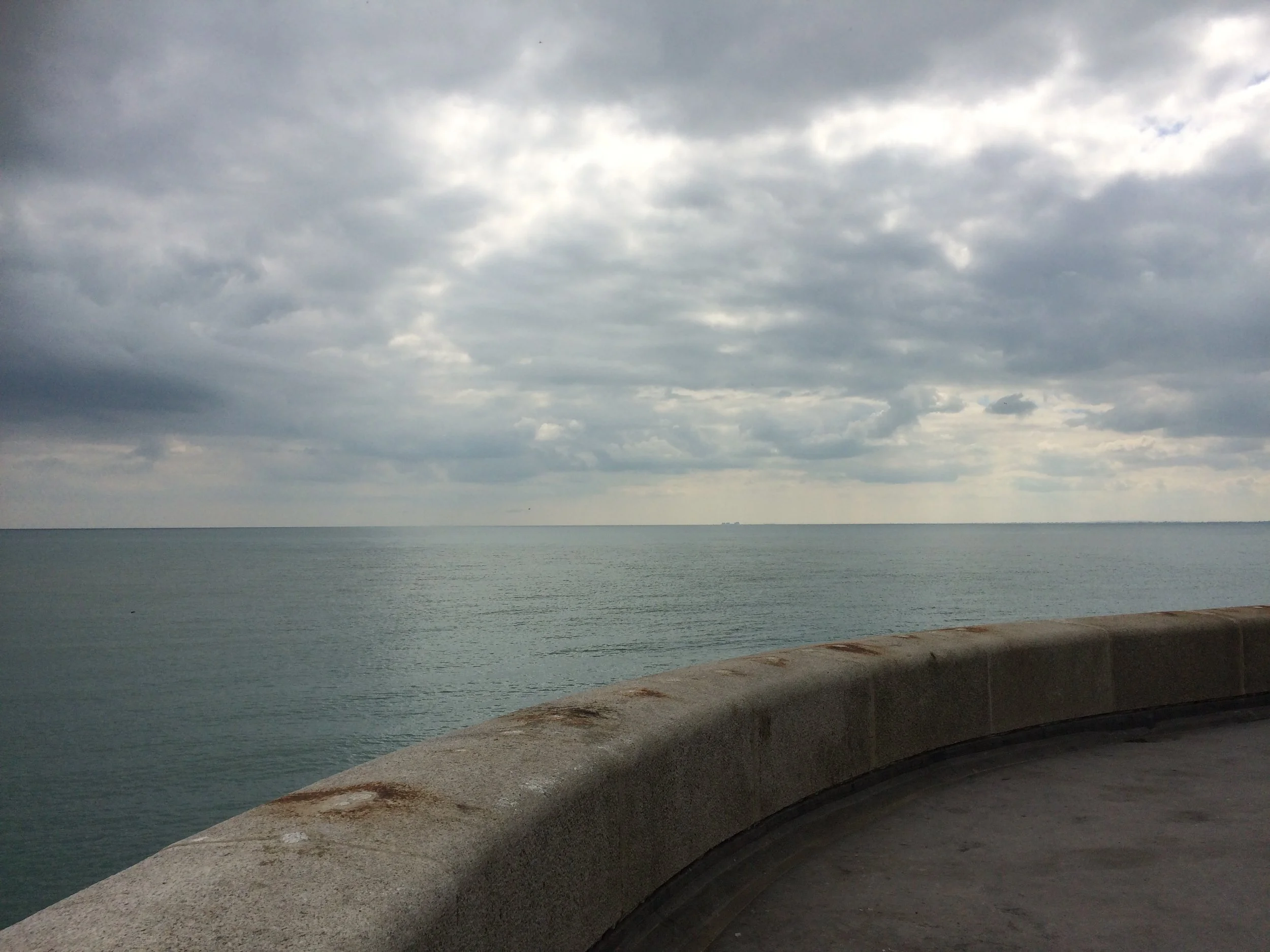 Gazing towards Dungeness from the arm that stretches out from Folkestone's harbour