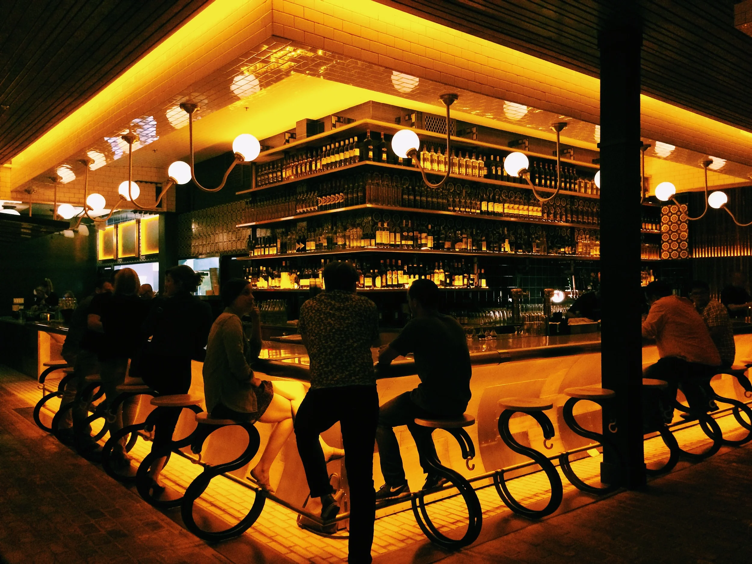 The bar turns into gold at night. 