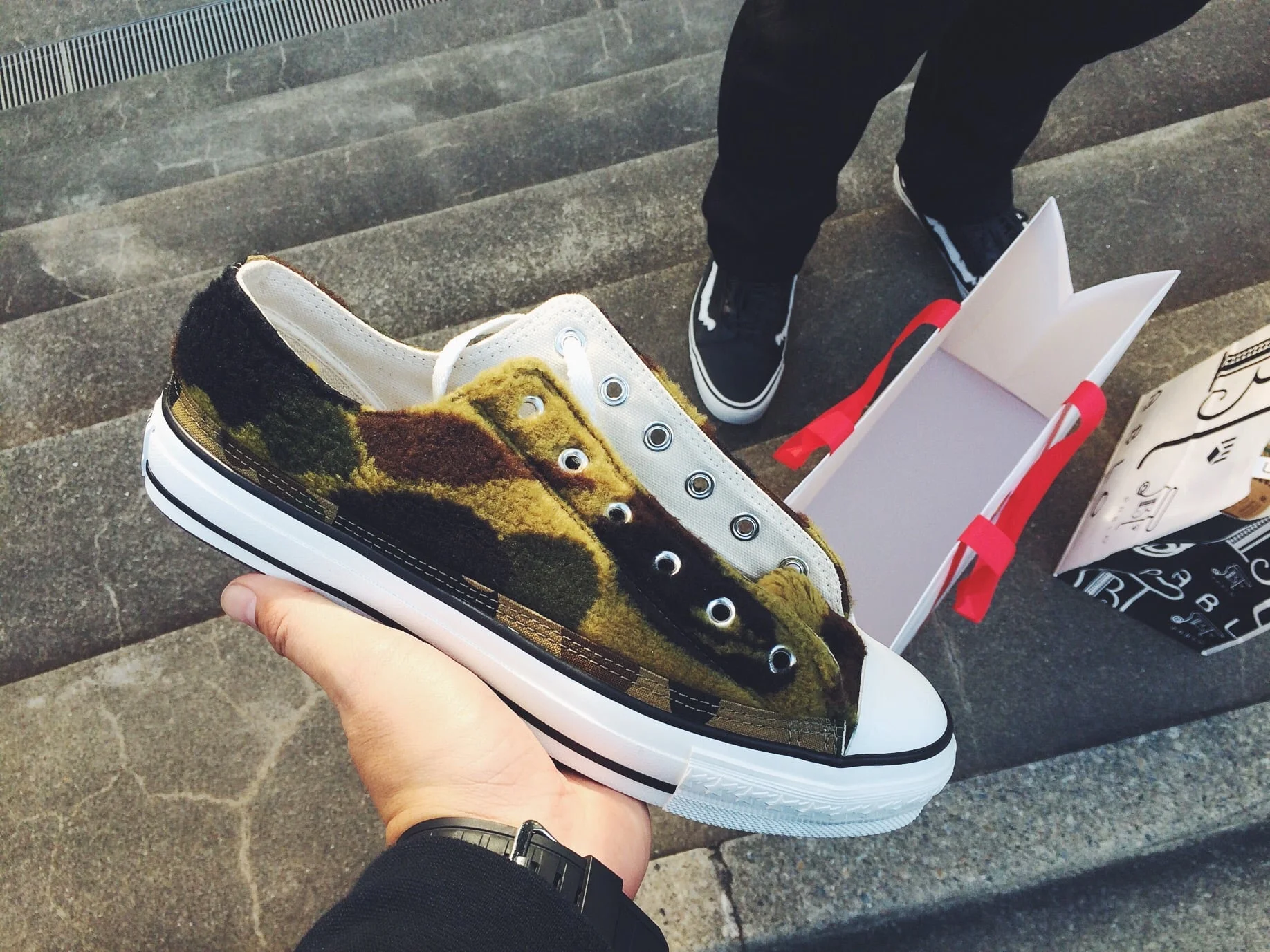 Since I didn't get anything for my brother for Christmas I bought him this Bape shoes. Bape's employees walked us out, handed him the bag and bowed. Tradition out here is dope. 