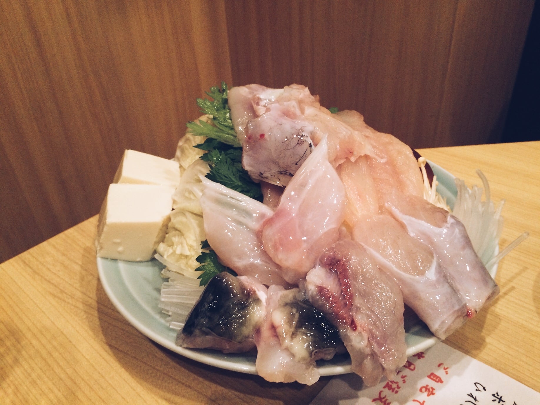 This shit was still twitching. This was thrown into the hot pot which was not bad at all. We had dipping sauce for the Fugu which made everything taste so much better with more flavors. 