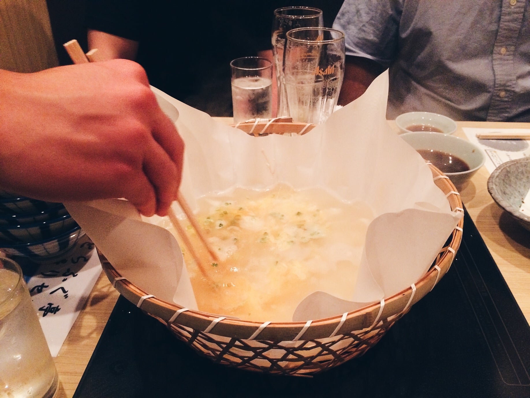 After we finished the hot pot, the waiter came in to whip something up using the broth in front of us. Great way of not wasting food. He dumped rice in it, then eggs and a tea spoon of soy sauce. What we get from it is magic ya'll. It was surprisingly good! Like a egg drop soup basically. 