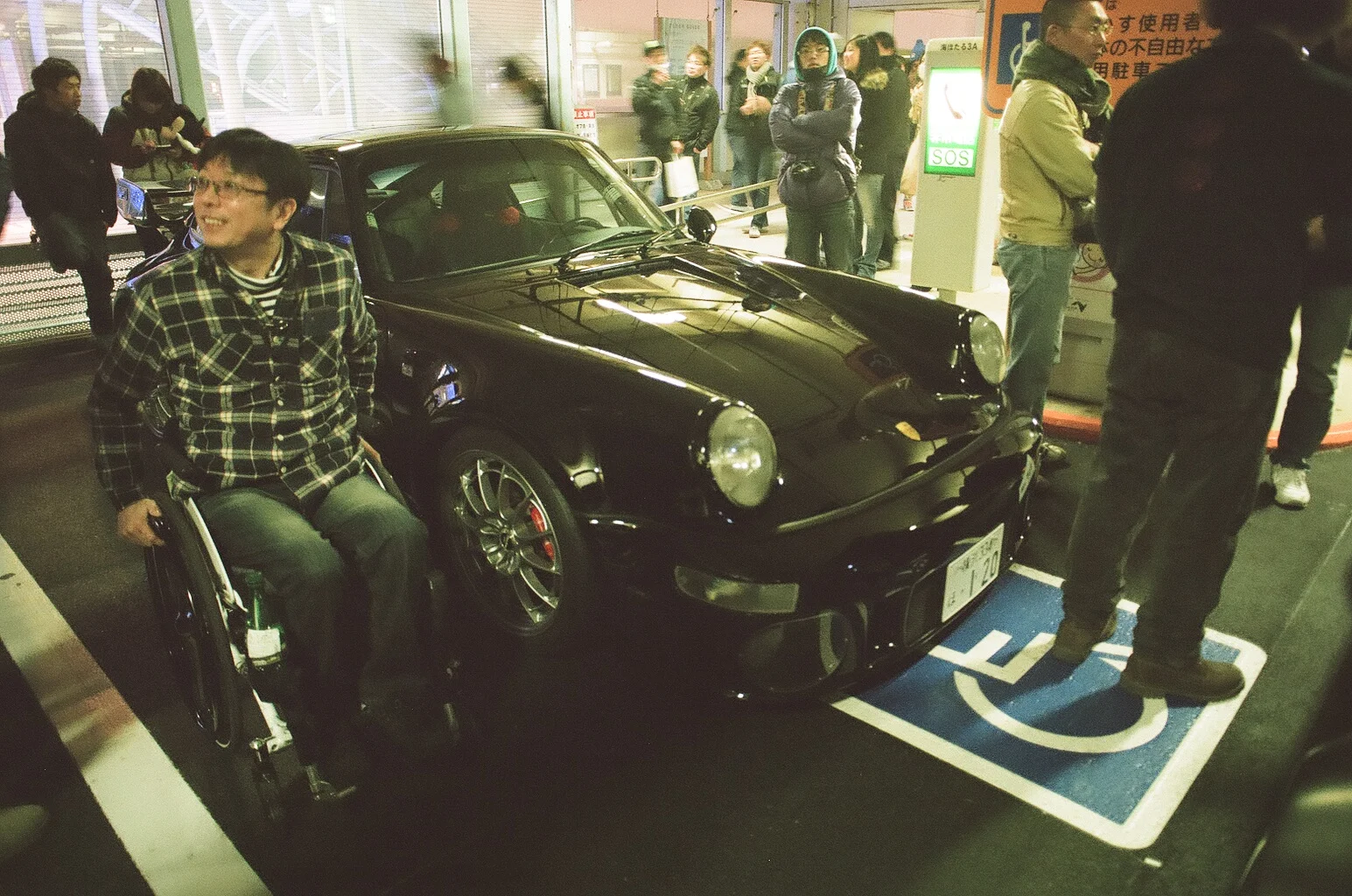At the Auto Fashion USA x The Chronicles night meet on the Aqua line. Beautiful Porsche next to the owner. 