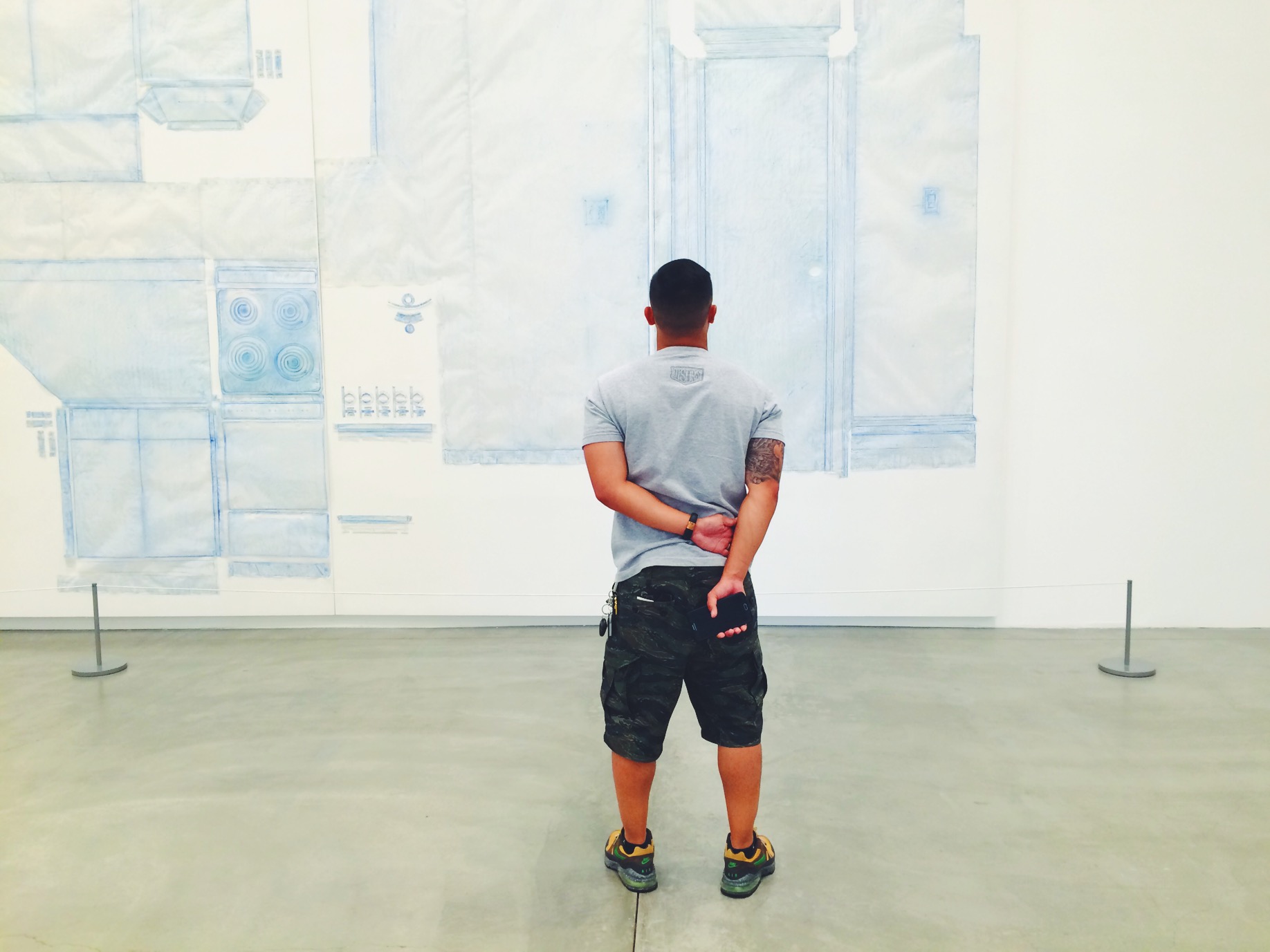 Rhandy joined us to check out the gallery as well. This paper was pasted on the walls of Do Ho Suh's apartment and chalk was used to trace the entire house. 