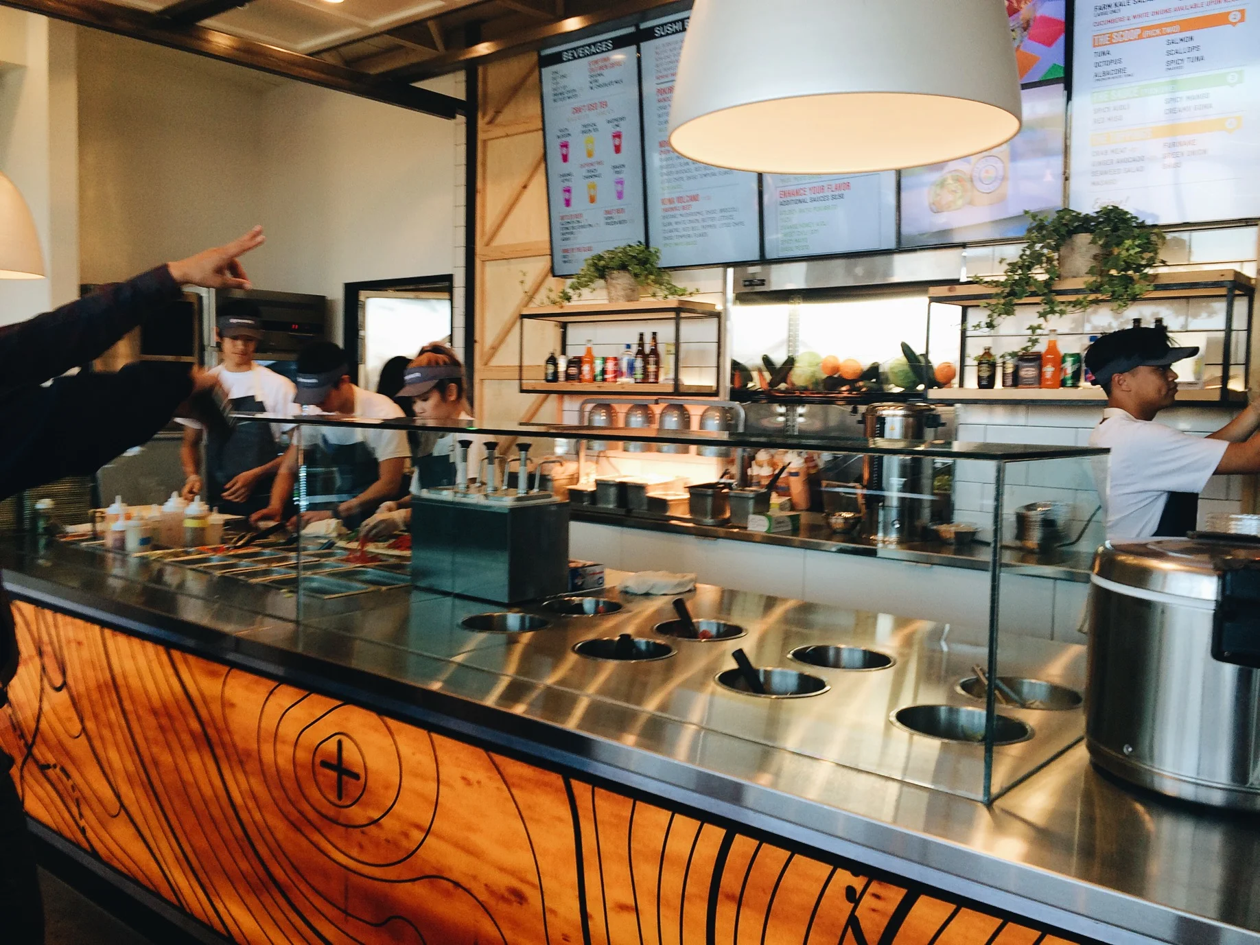 Alright folks, on the right is the bowl station and on the left is the burrito section. 