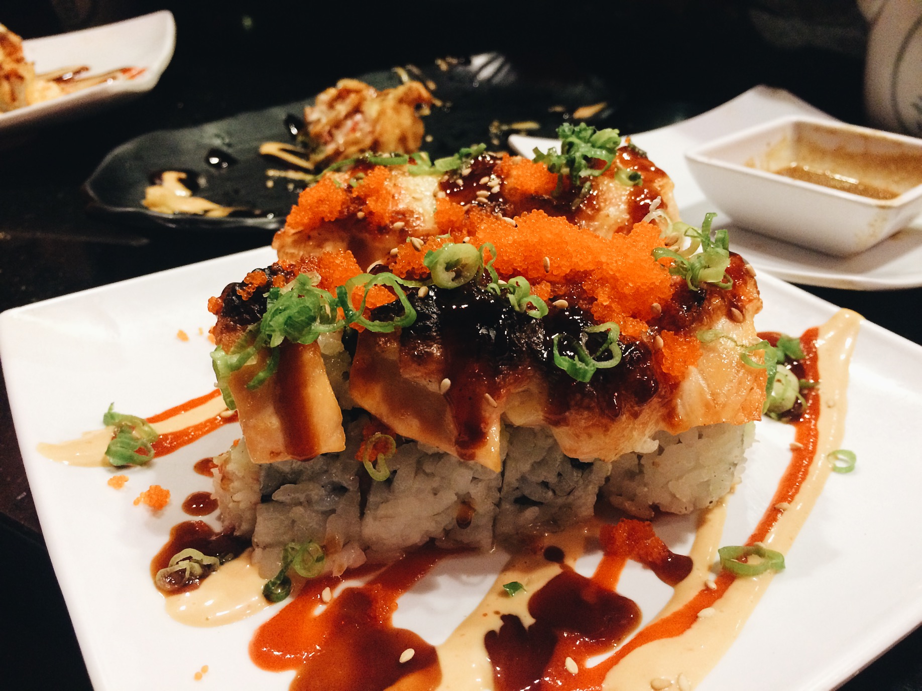 I randomly ordered this, Awesome Roll. I didn't know it was cooked tuna on top, I should've read the menu but I HATE cooked fish. I managed to finish most of it, I was pretty full by the time I got this. This right here, is what I meant when I say "doing too much." But hey, some people love it, I know I used to love it. 