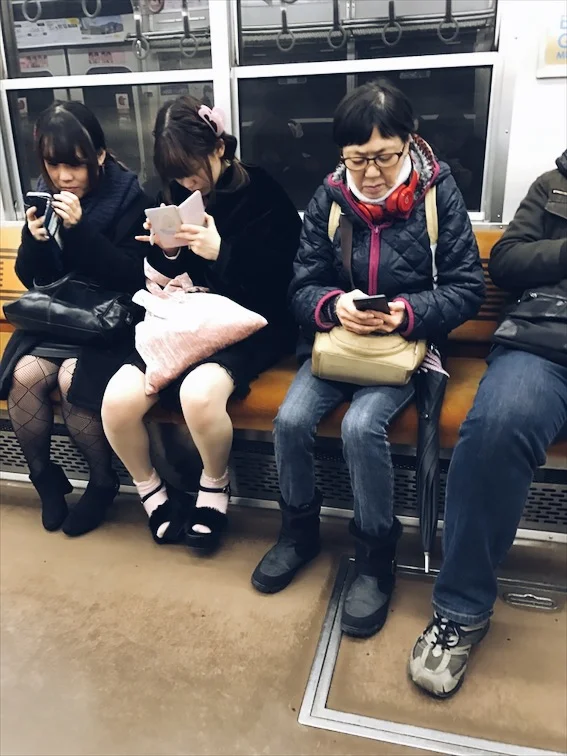 Sorry for this creeper shot but I wanted to show you how some of the young Japanese girls dresses. Taking the train back home to rest a bit and charge our electronics. 