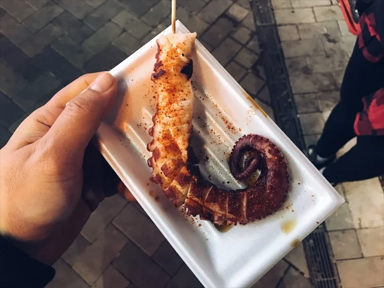 The steak house we wanted to eat at was closed so I grabbed some Octopus from the street food to hold me down till we find a spot to actually eat a meal. 