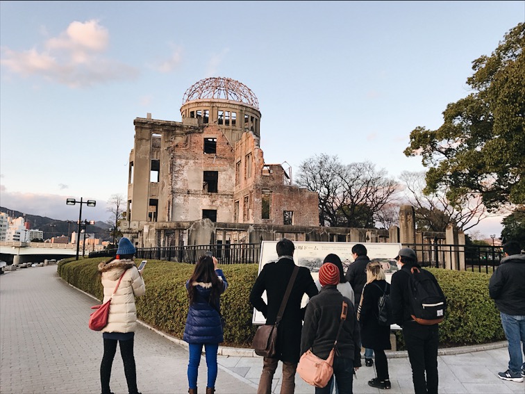The A-Bomb Dome, the bomb site. The Atomic bomb exploded above this building and took out everything else surrounding it. Very very emotional to be standing here reading the history on it. 