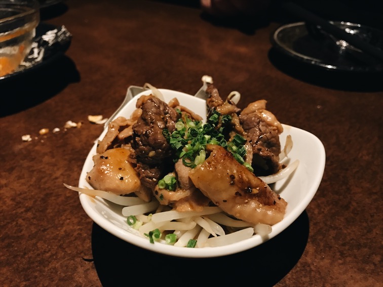 Some chicken skin and shit on sprouts. 
