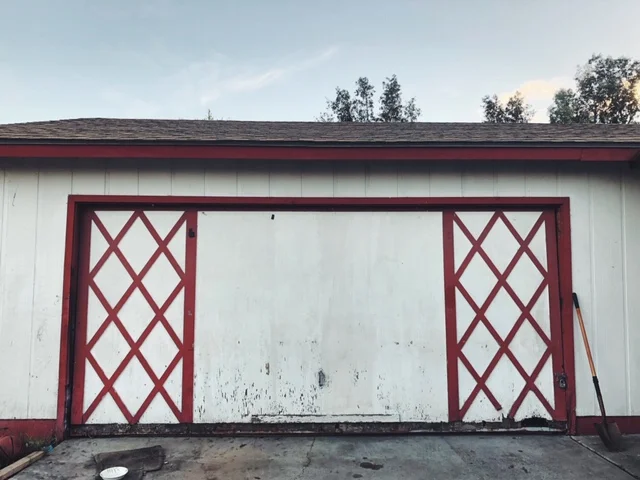 Old heavy garage door in poor condition. Got it replaced a few days later.