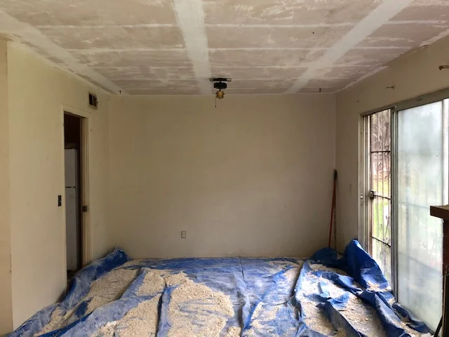 Popcorn removal in the living room.