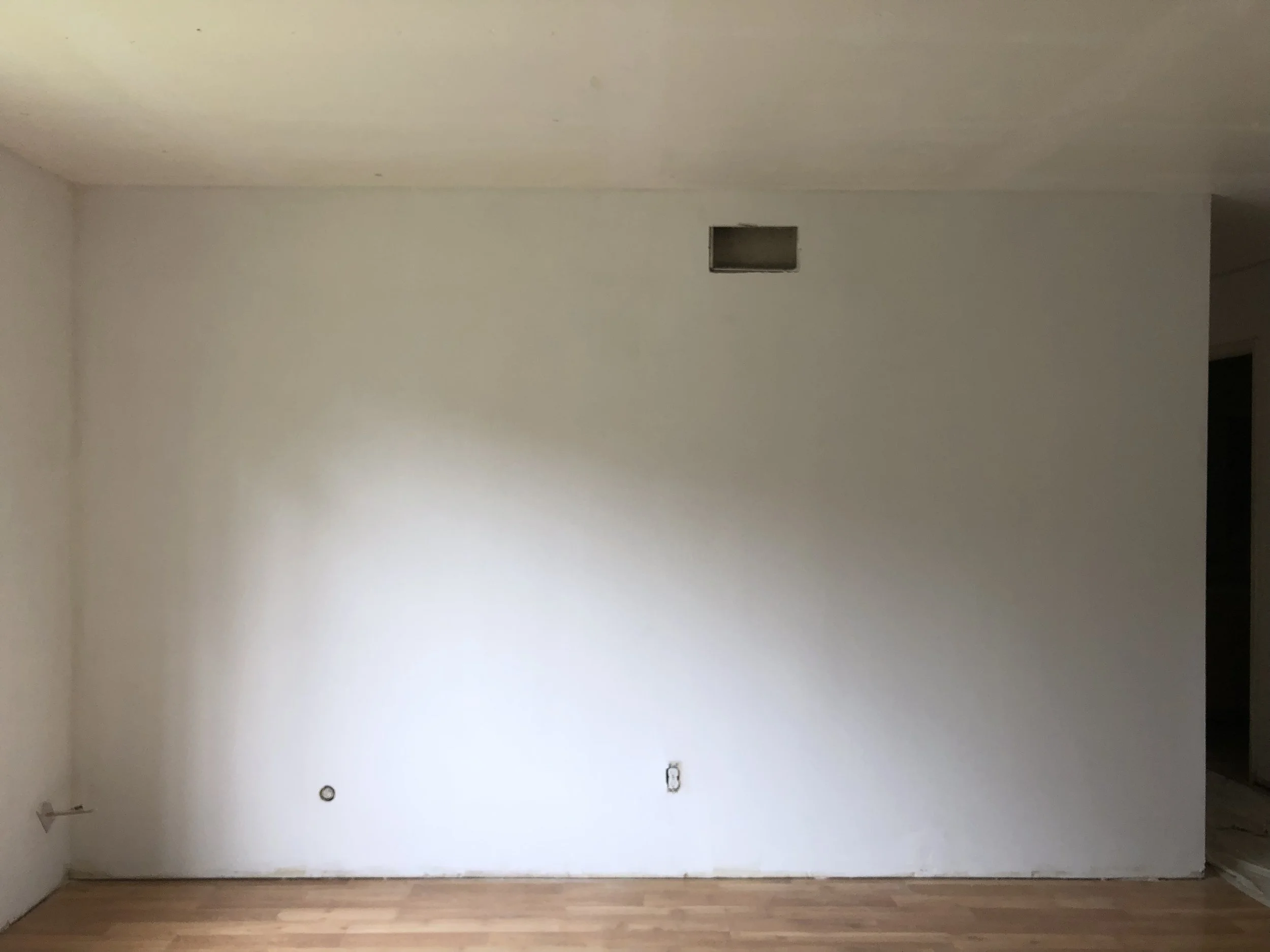 the north of the living room. Where I’ll set up some photos and the couch area, like a lobby. 