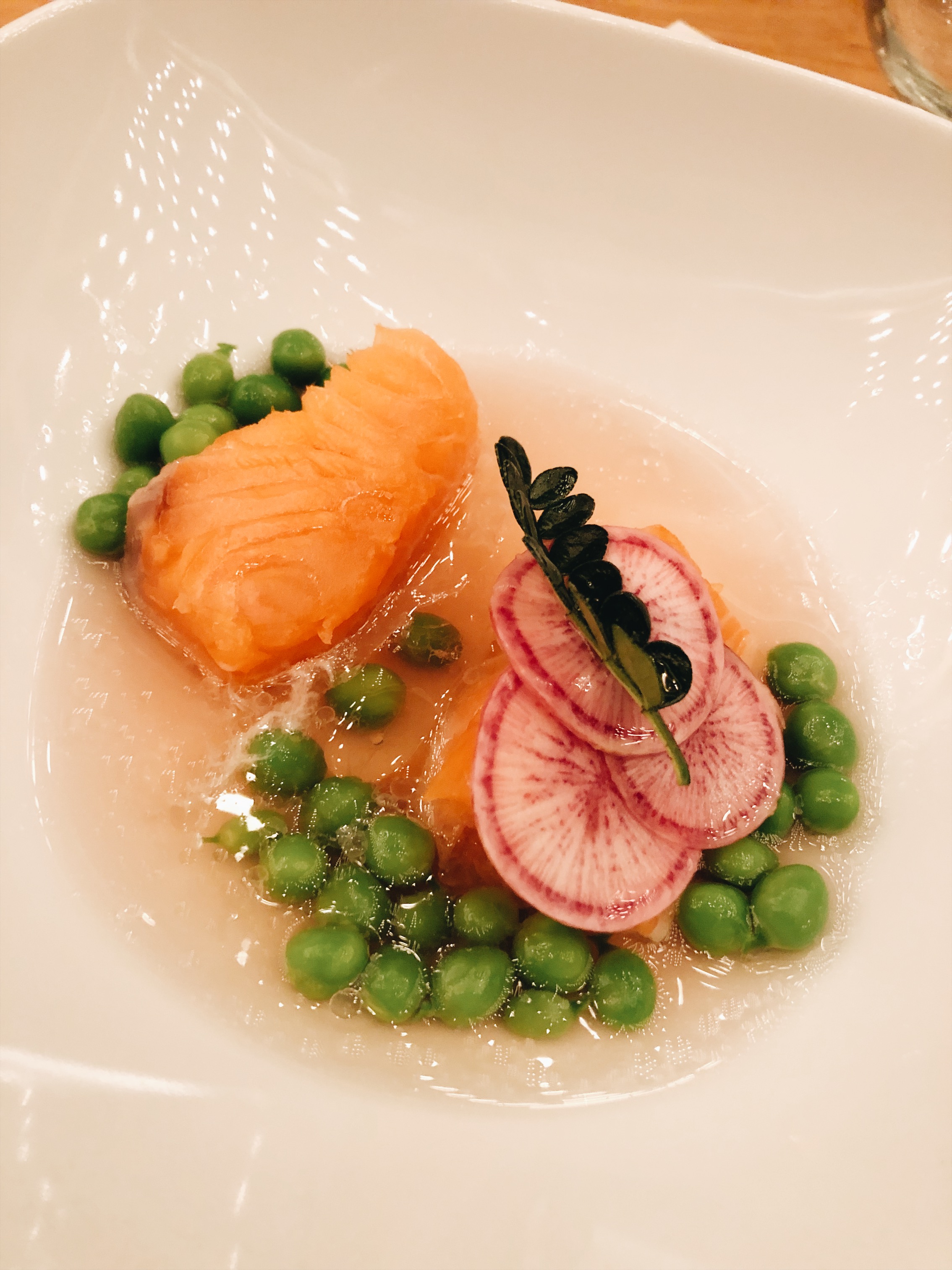 4th course: Salmon | Umeboshi Dashi. The broth is a synagogue soup, fucking delicious dish. I hate peas but I murdered these peas cuz they were so good! By the way, that’s a Kinome leaf on top and hard to get. It’s from Japan, the flavor was great but the experience from eating it was something I was not prepared for. It leaves your mouth tingling and the sensation dances on your tongue for quite a while. Almost a sense of orgasm to be honest. FUCK! I wanted to flip the table and bear hug the chef for such an experience.