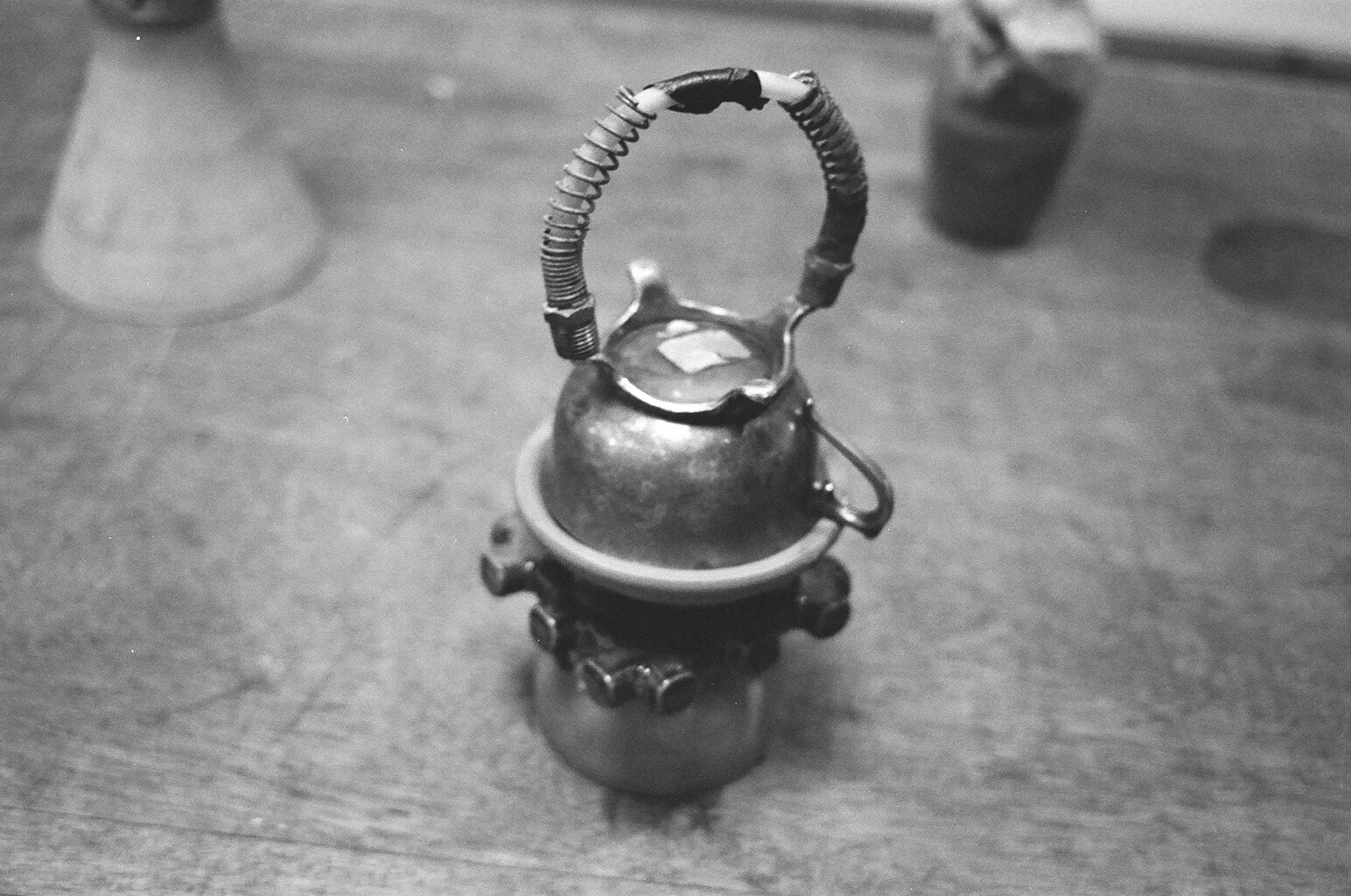   Welcome Home Sculpture Series, Merchant , found ceramics, metal cup, tubing, 8" x 4" x 4"   