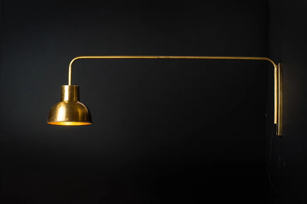 wall light with swing arm