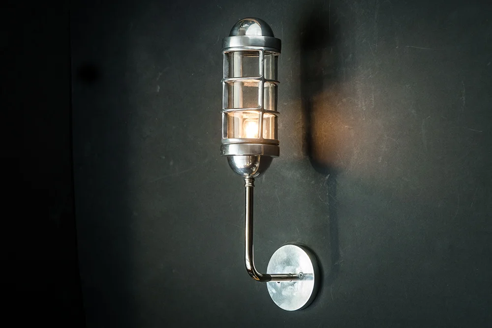 Caged capsule wall light 02.jpg