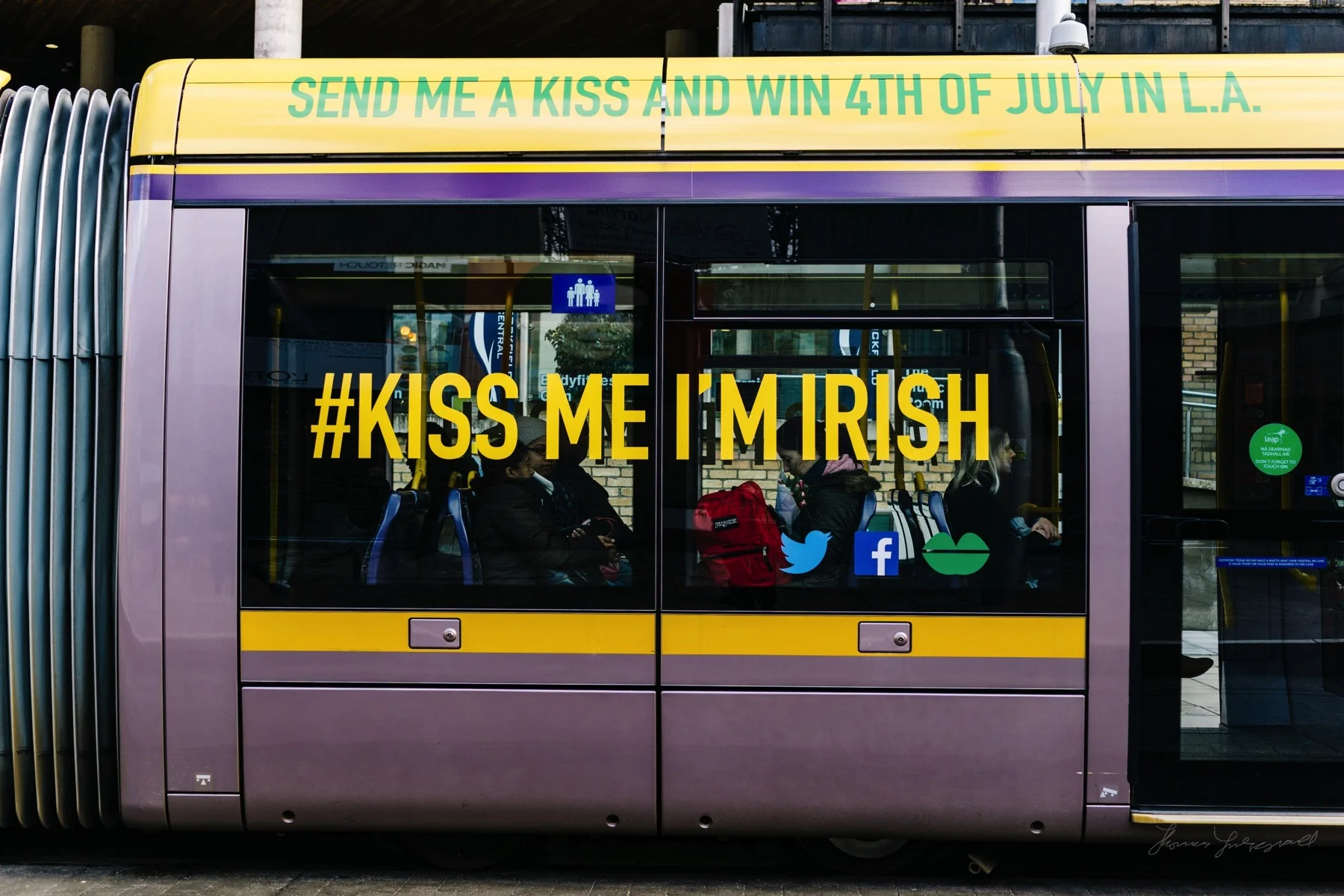 Luas Tram with "Kiss Me I'm Irish" on the side