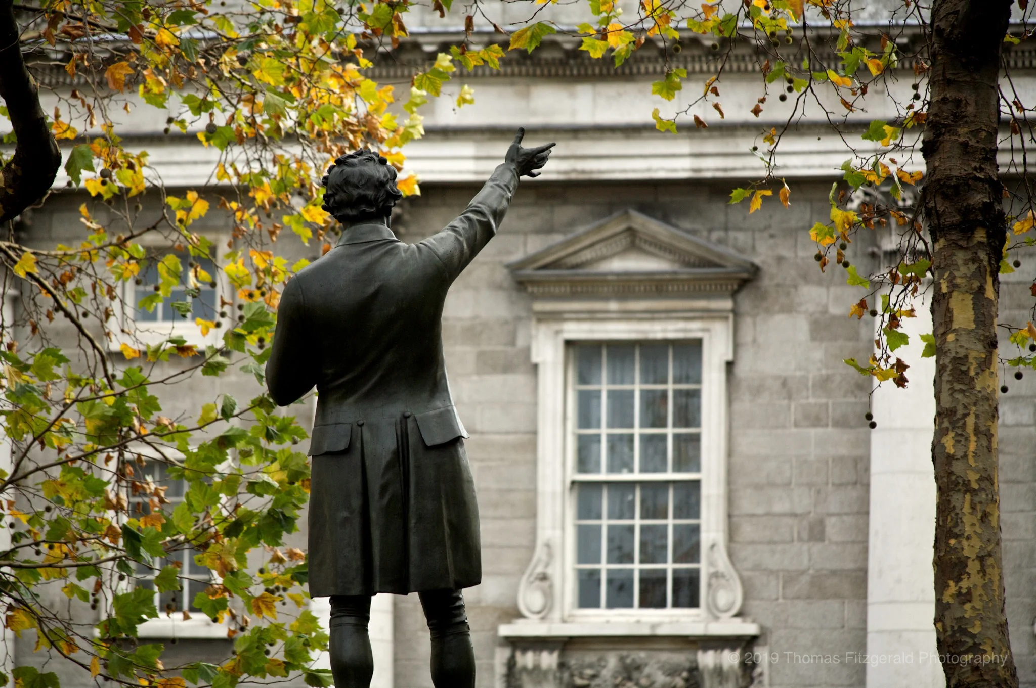 Statue in front of Trinity College