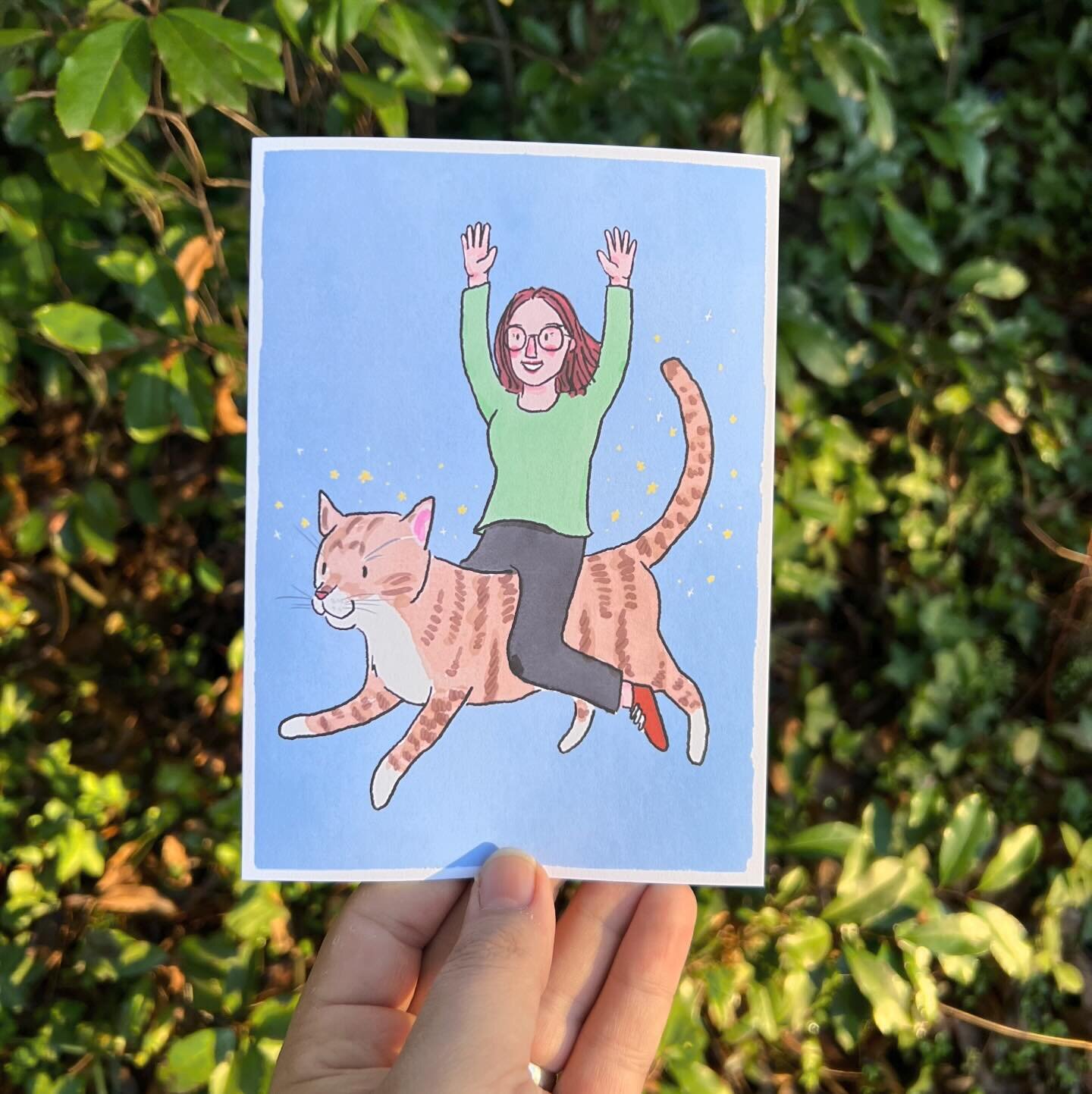 Best way to celebrate a friend&rsquo;s birthday? Illustrating a portrait of them riding a giant cat flying. @katiescarboroughart ✨🐈✨
.
#redriverpaper #catportrait #commission #birthdaygiftideas #illustration #flyingcat