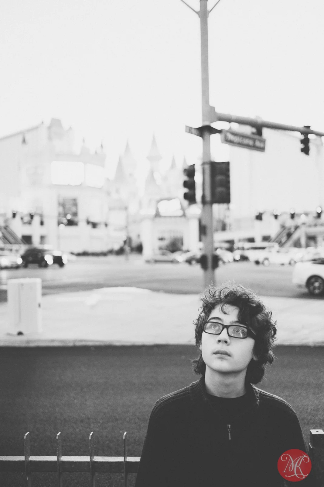 las vegas a boy looking up in wonder on a busy street
