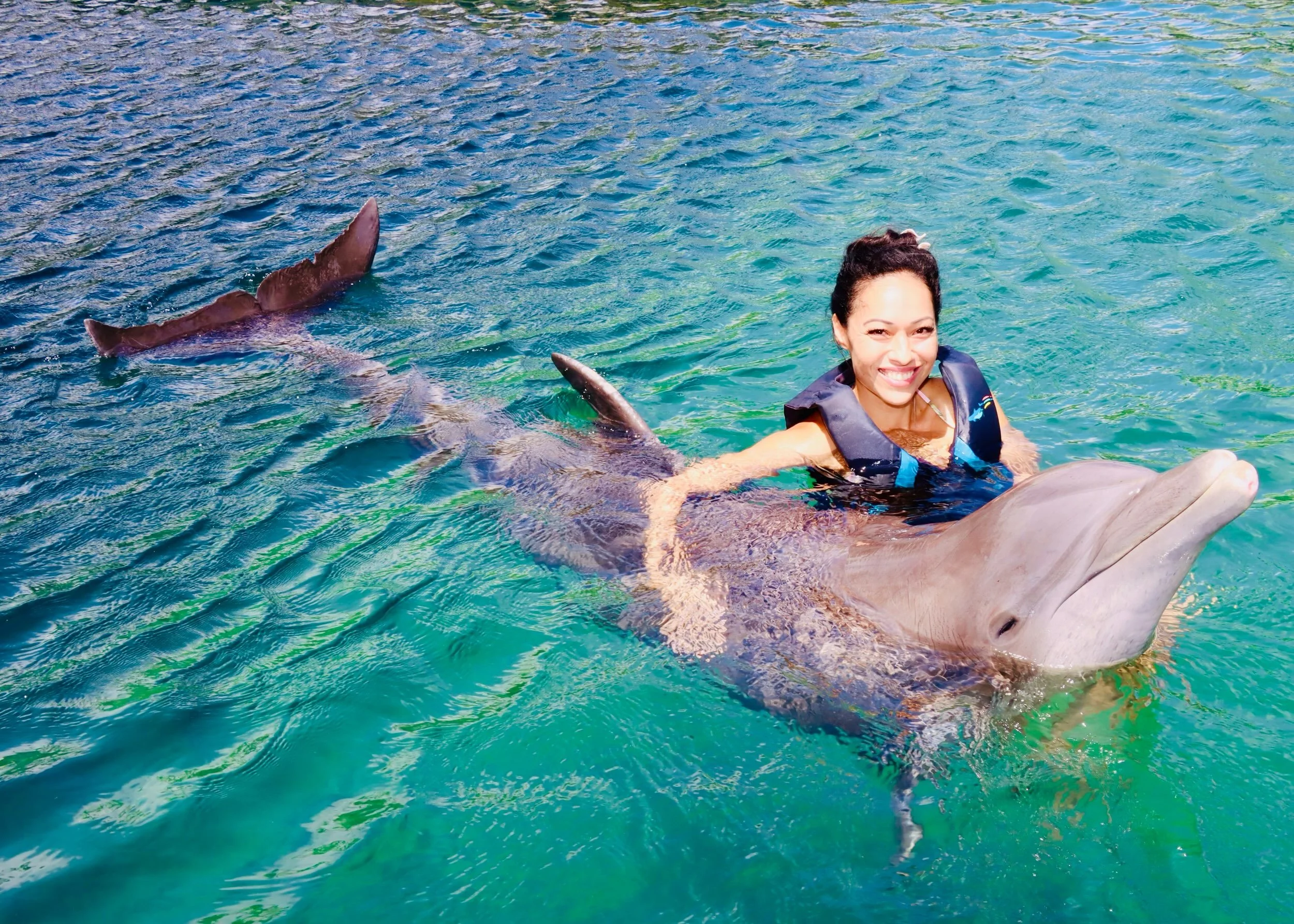 My Mom &amp; I have always shared a love for dolphins so we crossed swimming with them off our bucket list together. 🐬