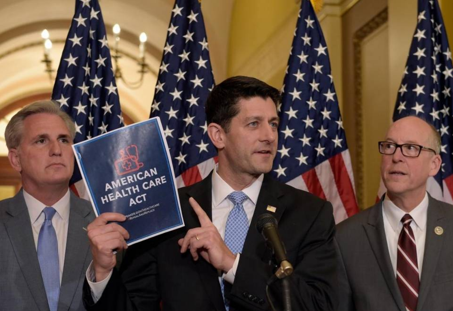 House Speaker Paul Ryan of Wisconsin, center, standing with Energy and Commerce Committee Chairman Greg Walden, R-Ore., right, and House Majority Whip Kevin McCarthy, R-Bakersfield, left, speaks during a news conference on the American Health Care Act on Capitol Hill in Washington March 7, 2017. Susan Walsh AP