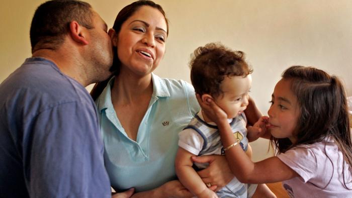 Liliana Sanchez de Saldivar during a 2007 visit from her husband Gerardo and children, including Gerardo Jr. and daughter Susy, while she lived at the United Church of Christ in Simi Valley while avoiding deportation. (Lawrence K. Ho / Los Angeles Times) (Lawrence K. Ho / Los Angeles Times)