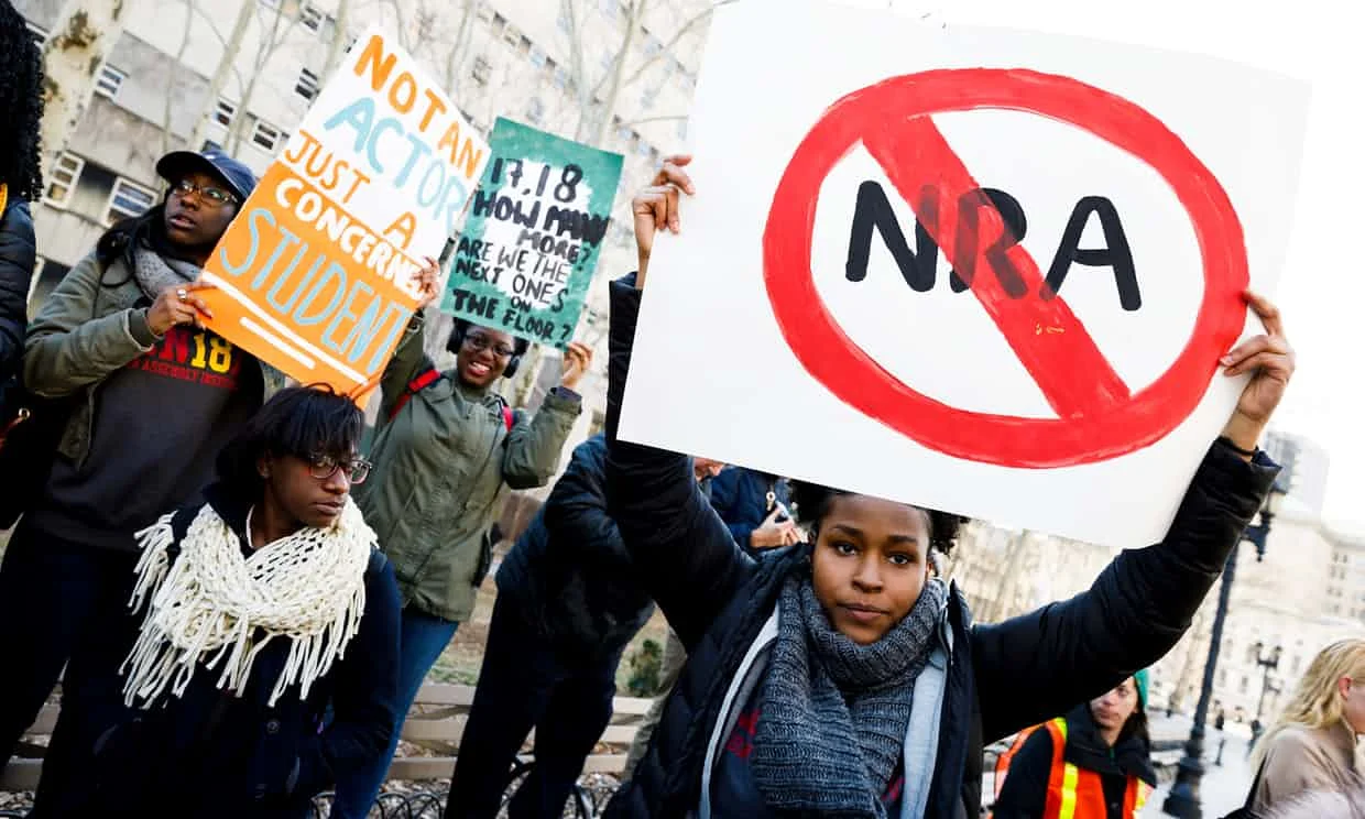 Students from area schools gather for a rally at Brooklyn Borough Hall to protest gun violence and to call on Congress to enact gun control measures in Brooklyn, New York, on 14 March. Photograph: Justin Lane/EPA