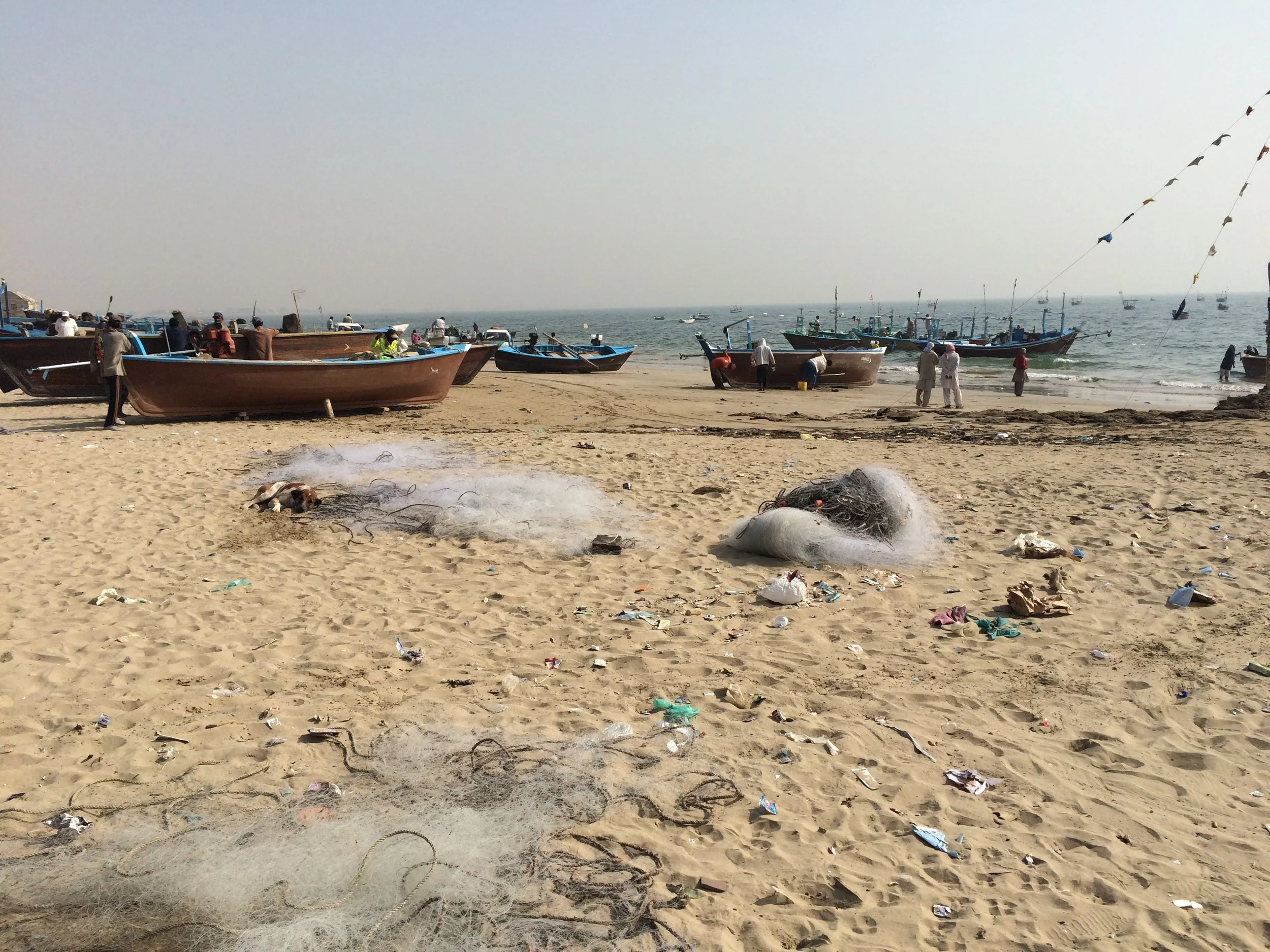 Beach at the RMG village with wooden boats of local fisherman