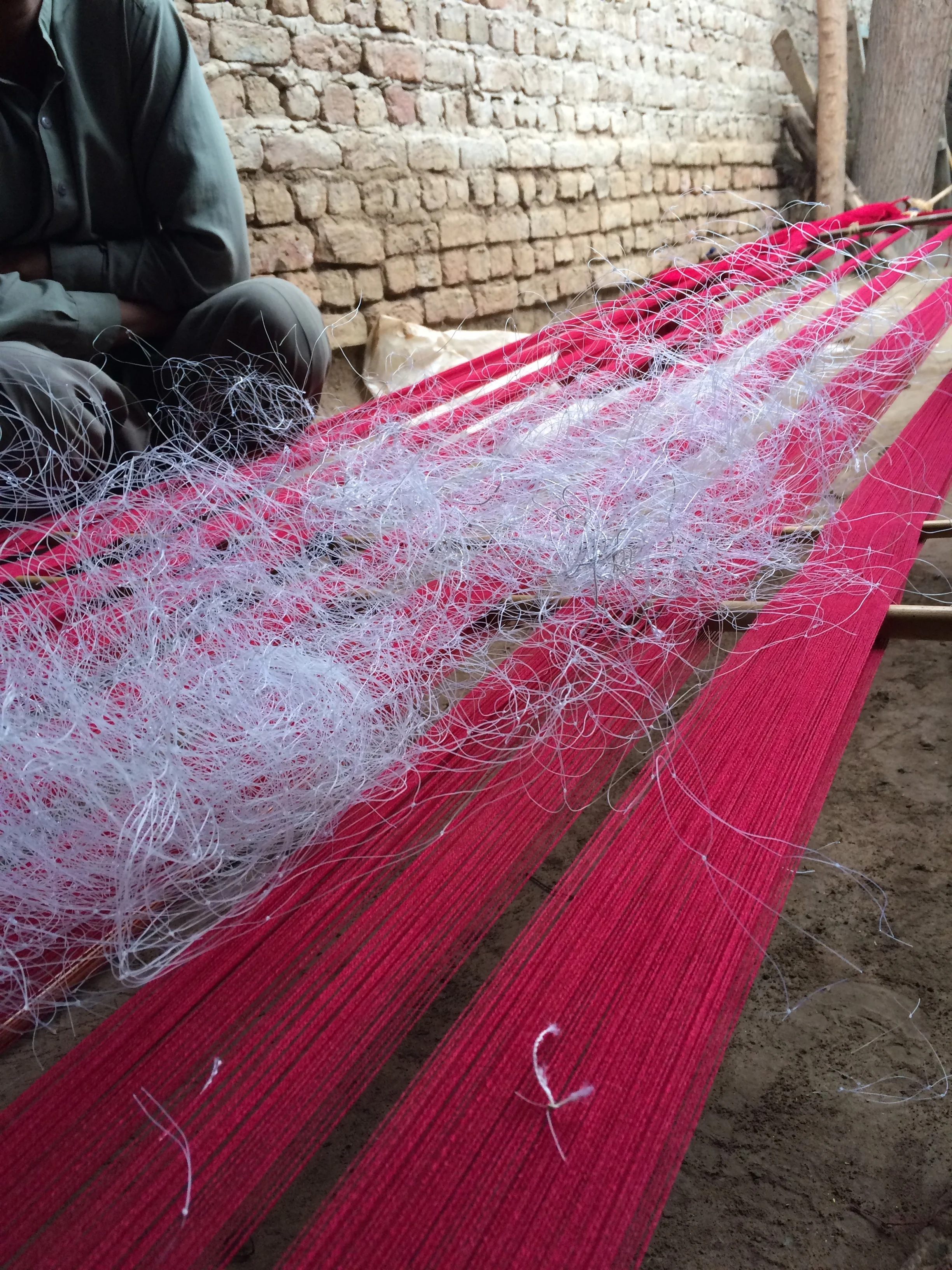 AMB village: discussing how to use ghost nets in weave
