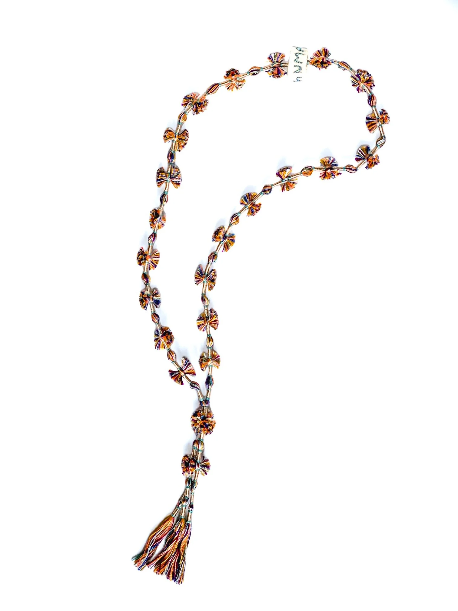 Salma Pompom necklace - Pastel peach, blue mix