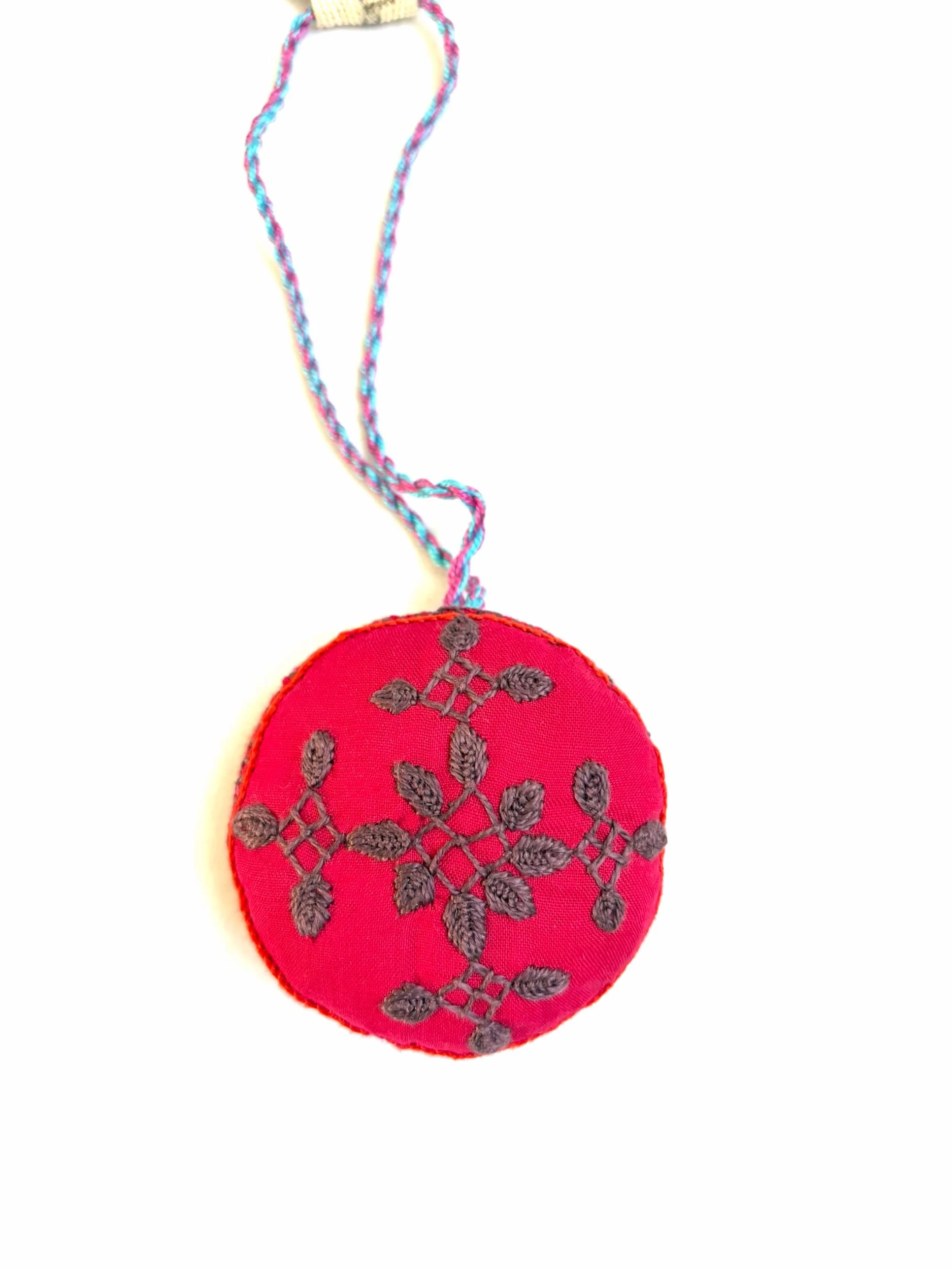 Round ornamental amulet - Cinnamon snowflake